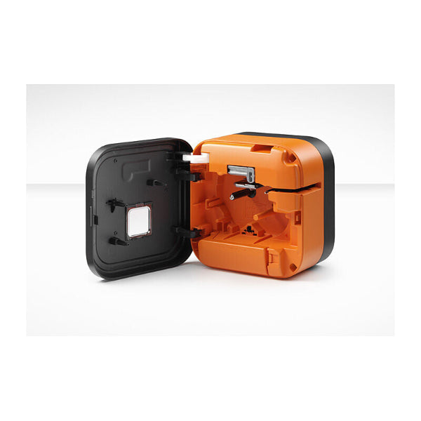 Orange and black tool attachment on a white background