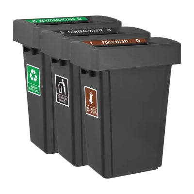 Three black recycling bins with labeled compartments on a white background