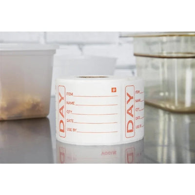 Roll of pre-printed labels on a reflective surface
